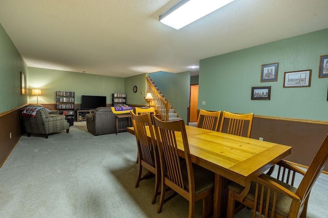 view of carpeted dining area