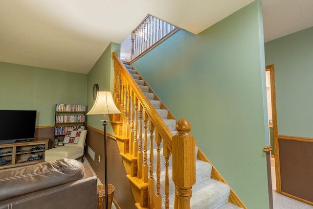 stairway with carpet floors