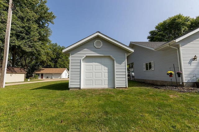 garage with a lawn