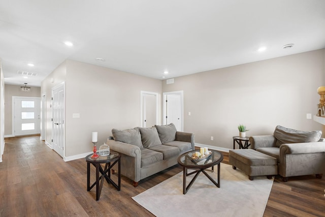 living room with dark wood-type flooring