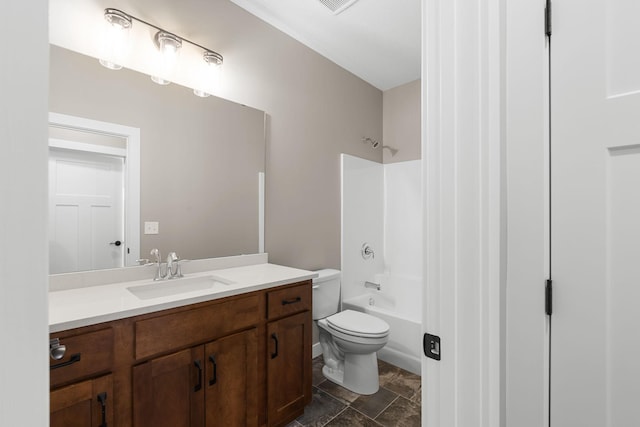 full bathroom featuring vanity, tub / shower combination, and toilet