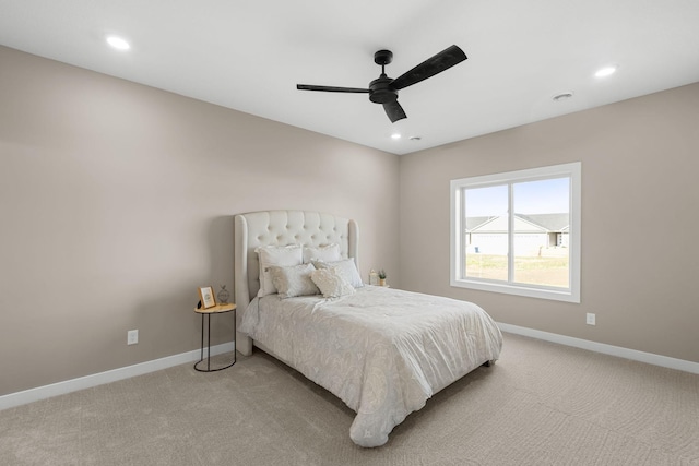 carpeted bedroom with ceiling fan