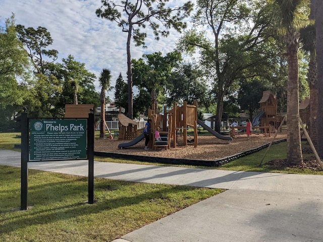 view of play area featuring a yard