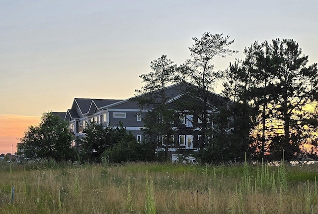 view of property exterior at dusk