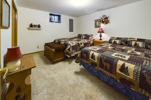 carpeted bedroom with electric panel and a textured ceiling