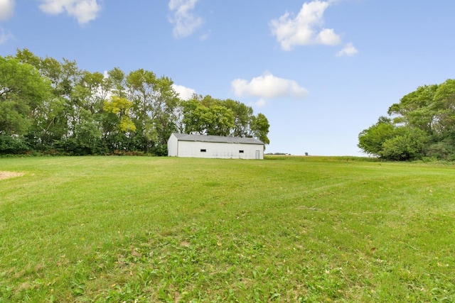 view of yard with a rural view