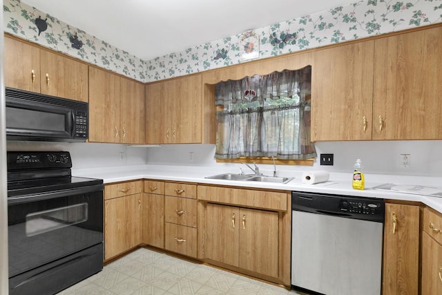 kitchen featuring black appliances and sink