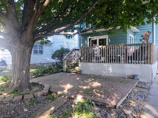 207 6th St, Montevideo, MN 56265 - rear view of house featuring a patio area and a wooden deck