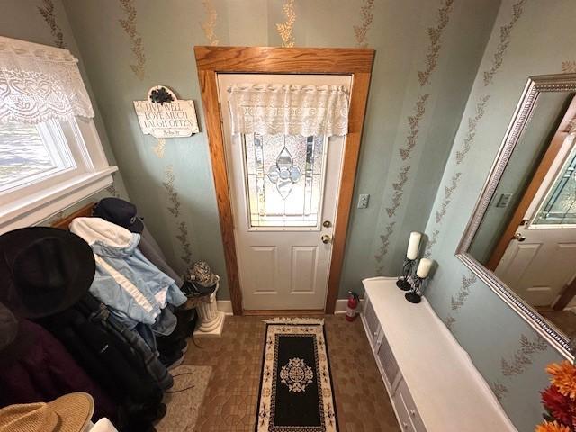 207 6th St, Montevideo, MN 56265 - doorway to outside with baseboards
