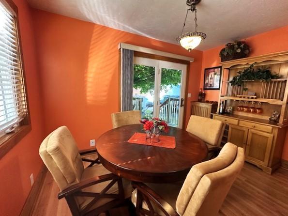 207 6th St, Montevideo, MN 56265 - dining space with wood finished floors and baseboards