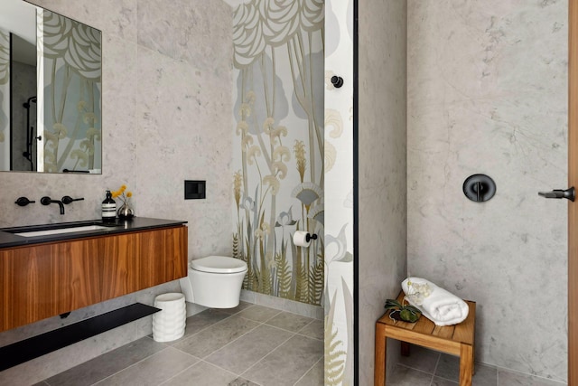 255 Hennepin Ave Unit 3402, Minneapolis, MN 55401 - bathroom with tile patterned floors, toilet, and vanity