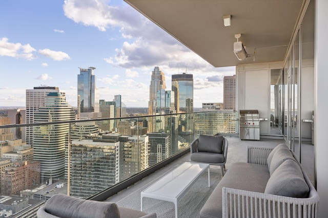 255 Hennepin Ave Unit 3402, Minneapolis, MN 55401 - balcony featuring a view of city, outdoor lounge area, and grilling area