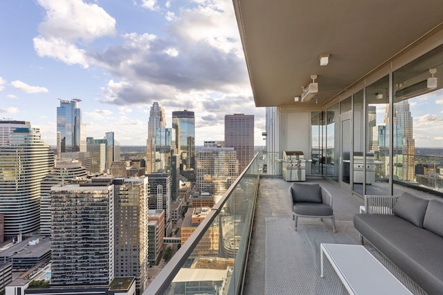 255 Hennepin Ave Unit 3402, Minneapolis, MN 55401 - balcony with a view of city, a grill, and an outdoor living space