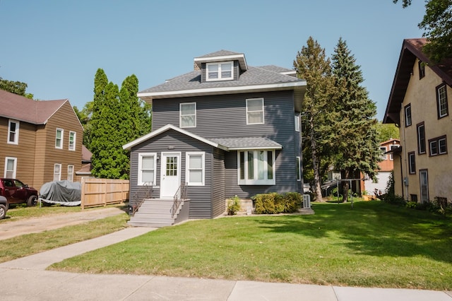 front facade with a front lawn