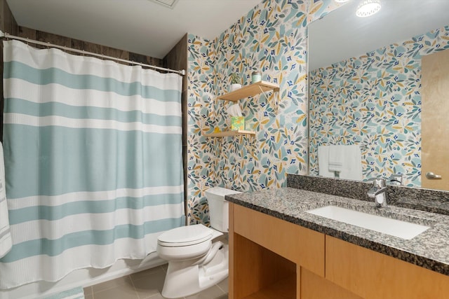 full bathroom with tile patterned floors, toilet, shower / tub combo, and vanity