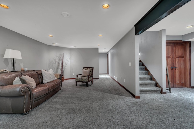 carpeted living room with stairs, baseboards, and recessed lighting