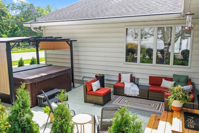 view of patio with an outdoor living space, a hot tub, and a deck