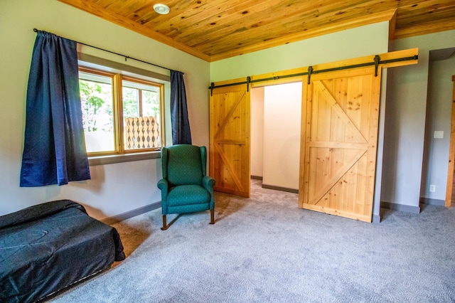 living area with light carpet, a barn door, wood ceiling, and ornamental molding