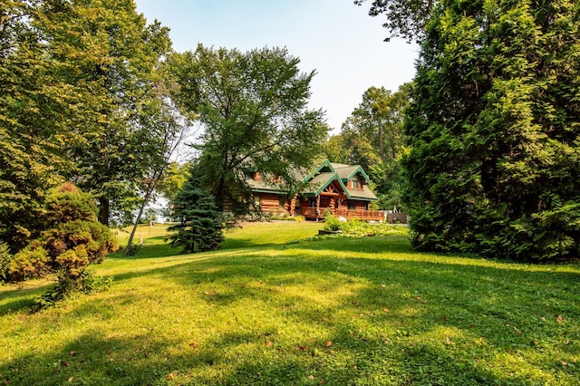 view of yard with a wooden deck