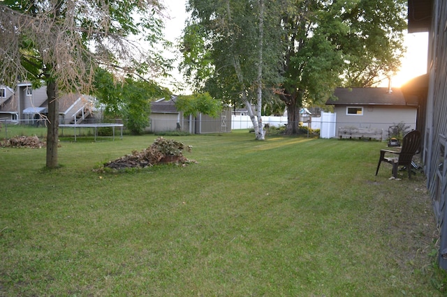 view of yard with a trampoline