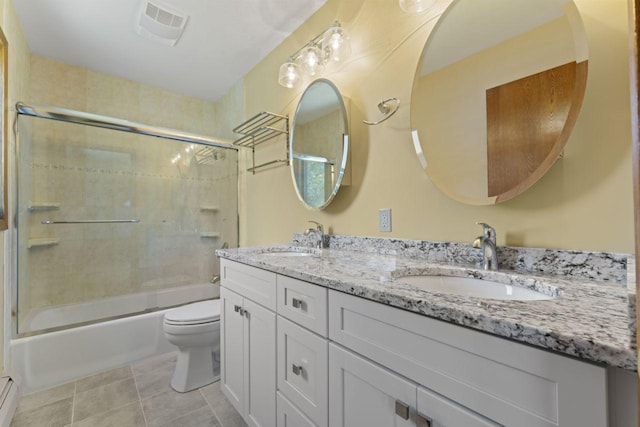 full bathroom with enclosed tub / shower combo, toilet, vanity, baseboard heating, and tile patterned flooring