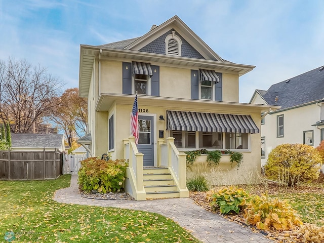 view of front of home with a front yard