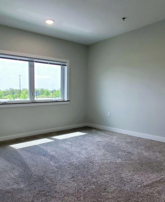 view of carpeted spare room