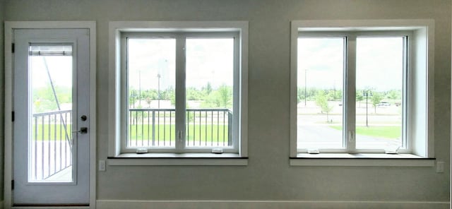 doorway to outside featuring a wealth of natural light