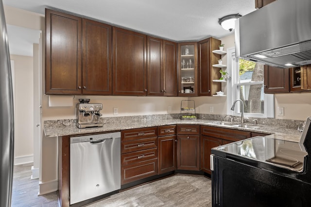 3509 43rd Ave S, Minneapolis, MN 55406 - kitchen with appliances with stainless steel finishes, exhaust hood, light wood-style flooring, and open shelves