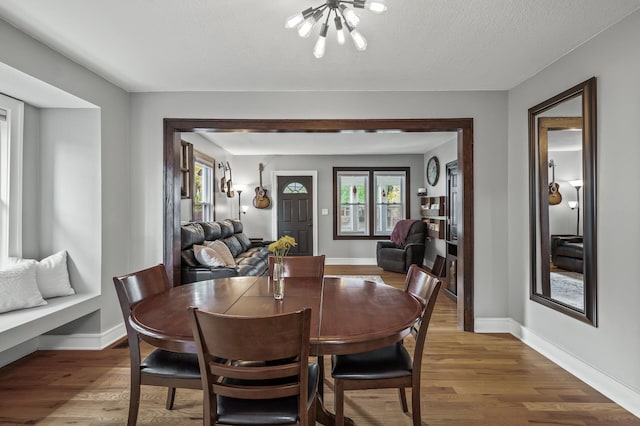 3509 43rd Ave S, Minneapolis, MN 55406 - dining room with a chandelier and light wood-style floors