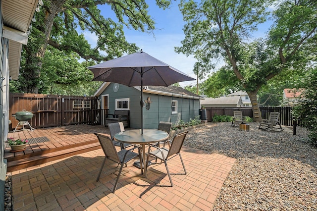 3509 43rd Ave S, Minneapolis, MN 55406 - fenced backyard featuring outdoor dining space, area for grilling, a patio area, and a wooden deck