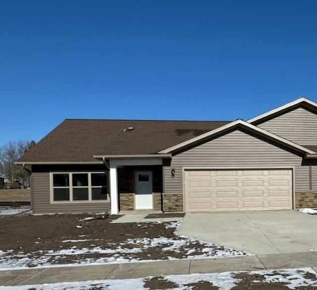 view of front of property with a garage