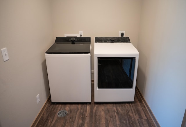2218 Red Bird Ln, Fairmont, MN 56031 - laundry area with washing machine and dryer and wood finished floors
