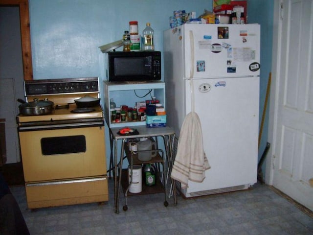 kitchen featuring white appliances