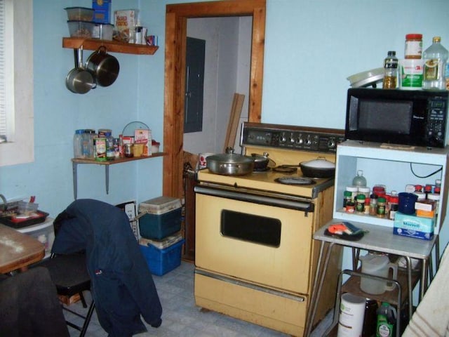 kitchen featuring white electric range oven and electric panel