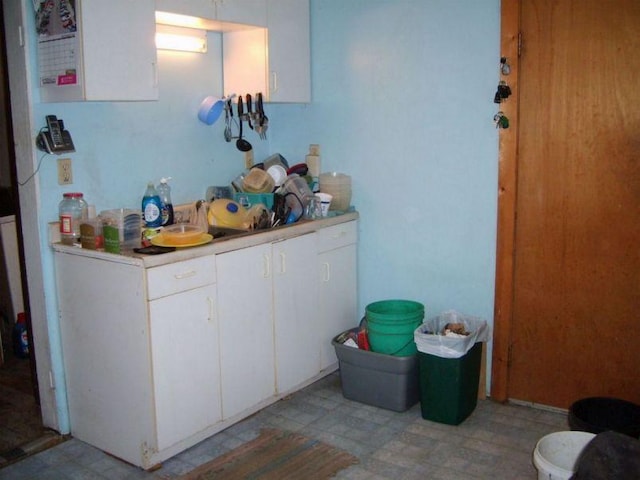 kitchen with white cabinets