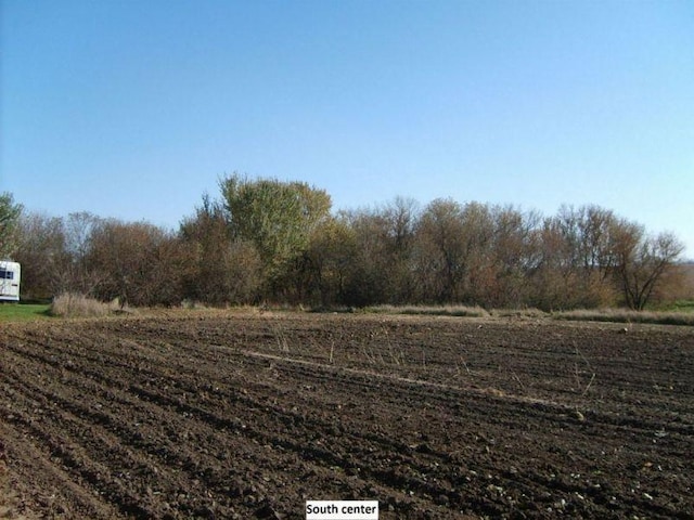 view of yard with a rural view