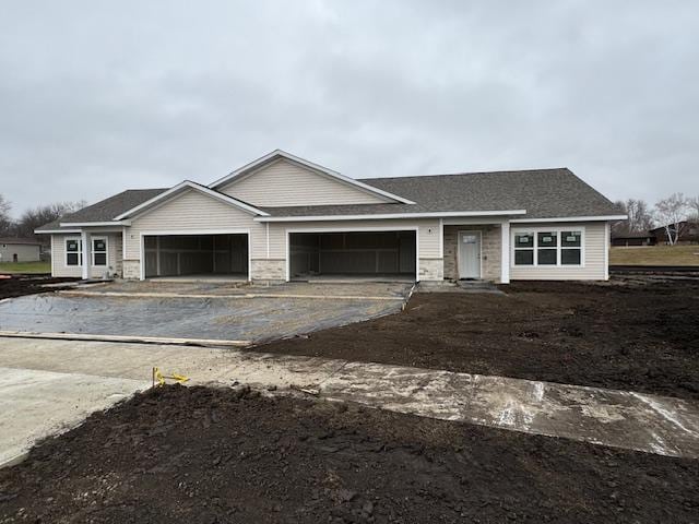 ranch-style home with a garage