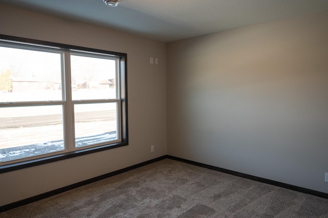 2224 Red Bird Ln, Fairmont, MN 56031 - carpeted empty room with baseboards