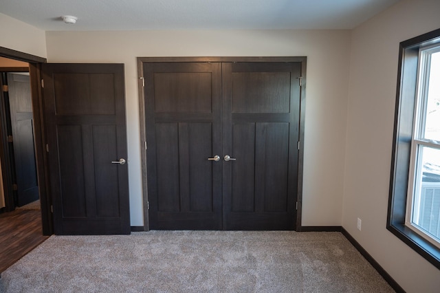 2224 Red Bird Ln, Fairmont, MN 56031 - unfurnished bedroom with carpet flooring and a closet