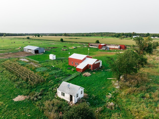 birds eye view of property featuring a rural view