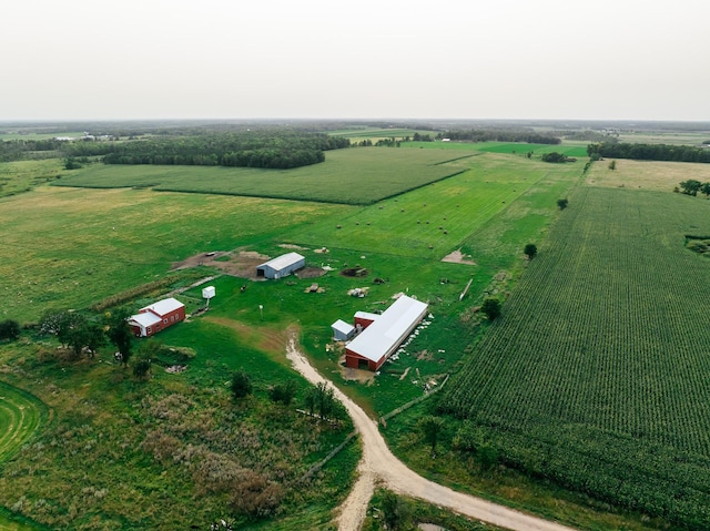 birds eye view of property with a rural view