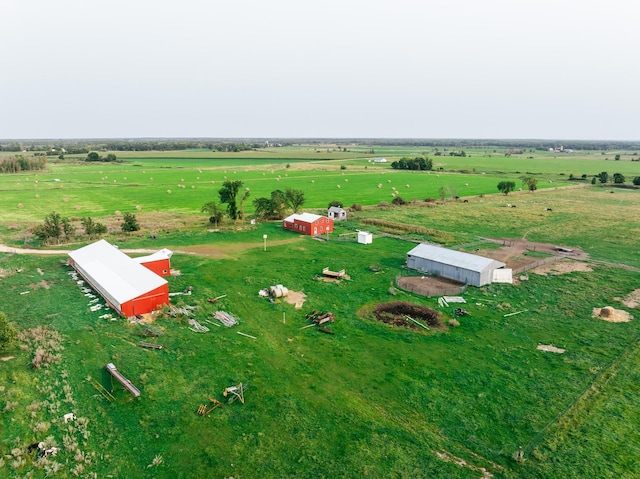 birds eye view of property featuring a rural view