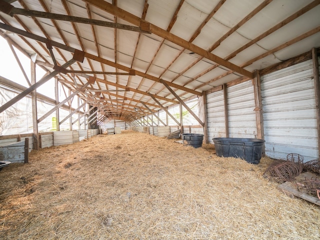 miscellaneous room with a healthy amount of sunlight and vaulted ceiling