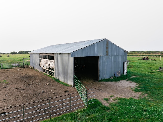 view of outbuilding with a rural view