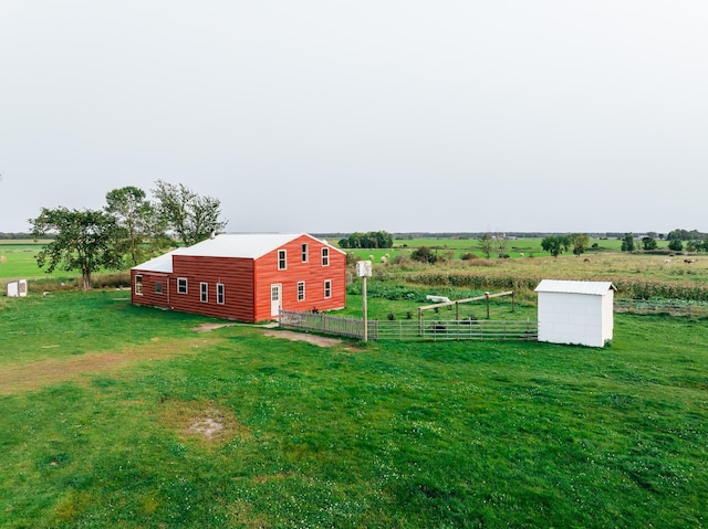 view of yard with a rural view