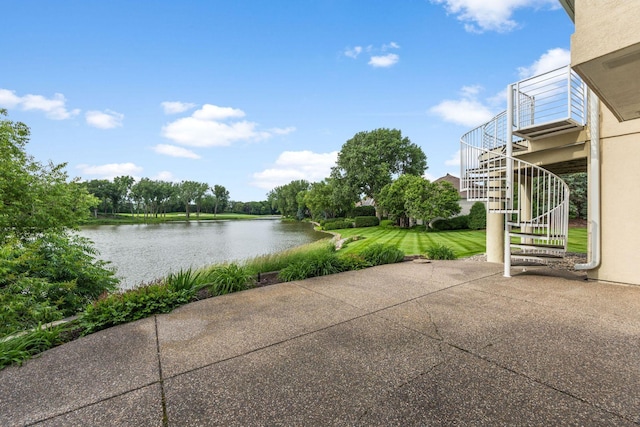 17680 Bearpath Trl, Eden Prairie, MN 55347 - view of patio / terrace with stairway and a water view
