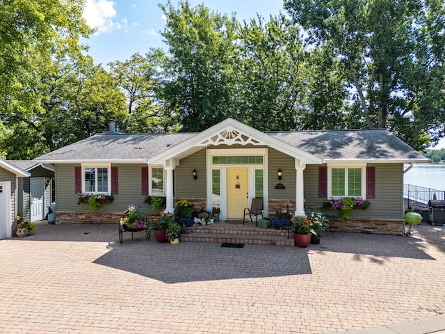 ranch-style home with covered porch