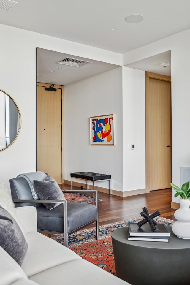 living room featuring dark wood-type flooring