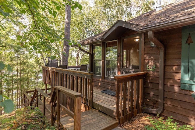 deck featuring a sunroom